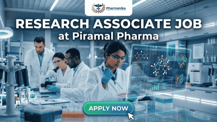 Research Associate Job at Piramal Pharma. A professional and vibrant featured image for a Research Associate Job at Piramal Pharma. It depicts a focused scientist in a sleek, modern pharmaceutical laboratory working with a digital AR interface showing chemical compounds and data charts. Other researchers are visible in the background. The Biotecnika logo is at the top, and a bright green 